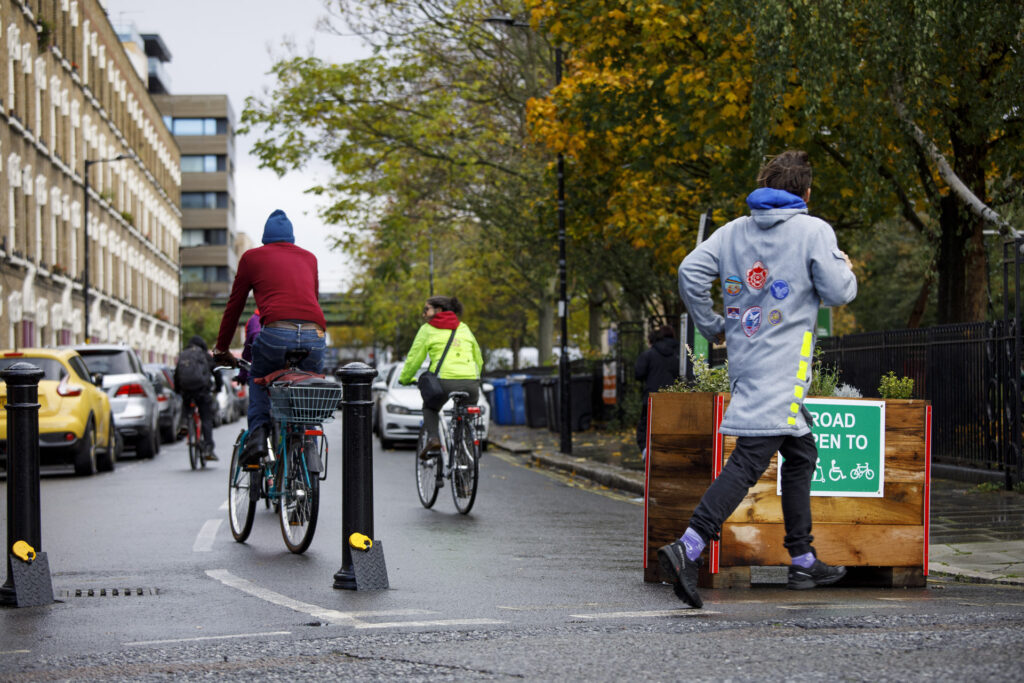 People cycling and running near LTN filter